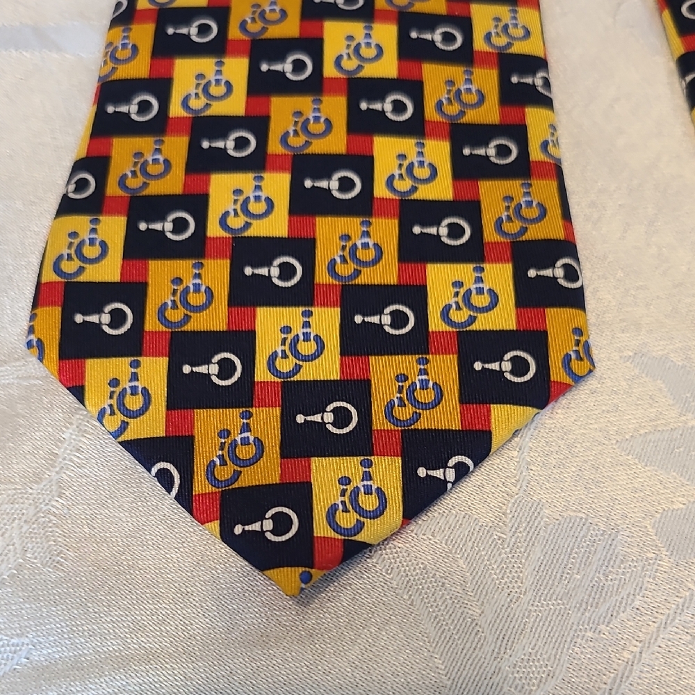 Gucci Red Blue and Yellow Silk Tie with Iconic Geometric Pattern